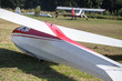a sailplane and his .towing aircraft on an airfield