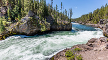 Fast Flowing River On The Background Of The Rocky Coast. Brink Of The Upper Falls, Grand Canyon Of Yellowstone, Yellowstone National Park, Wyoming