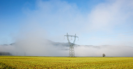 Big electricity high voltage pylon with power lines