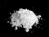 Fototapeta Krajobraz - Cocaine drug powder on black background
