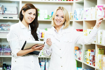 Wall Mural - Pharmacy chemist women in drugstore