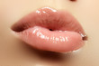 © looking2thesky - Close-up of a beautiful sexy natural lips giving kiss. Nice full lips with gloss lip makeup. Fashion makeup. Sexy lips. Beauty lips makeup detail
