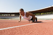 © Westend61 - Young sportsman making pushups