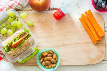 Wall Mural - Making school lunch on wood background