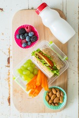 Wall Mural - Making school lunch on wood background