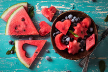Summer Fruit Salad Of Watermelon And Berries. Slices Of Watermelon In The Shape Of A Star,heart,moon .wooden Background