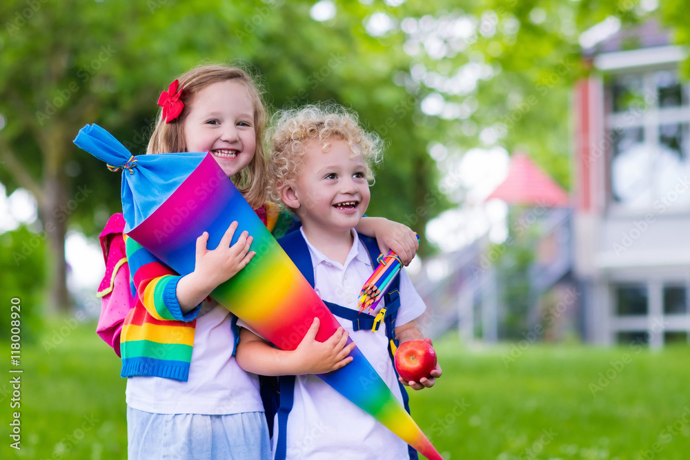 Kids with candy cone on first school day in Germany