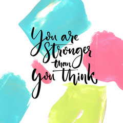 Wall Mural - You are stronger than you think. Motivational saying at artistic paint strokes background