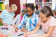© WavebreakMediaMicro - Kids drawing in paper