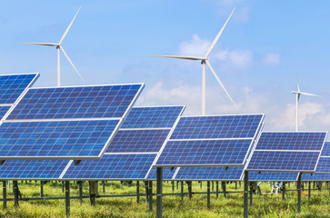 Wall Mural - photovoltaics module solar panels and wind turbines generating electricity renewable green energy wi