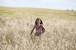© Andrey_Arkusha - Beautiful young little girl running summer field