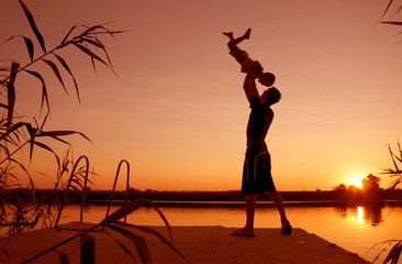 Family sunset on the lake