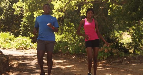 Poster - Woman and man are finishing their jogging 