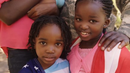 Poster - Portrait of american soldier children is smiling 