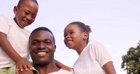 Poster - Happy man holding his children 