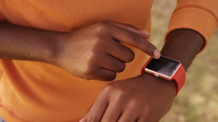 Poster - Close up of a man is wearing a smart watch 