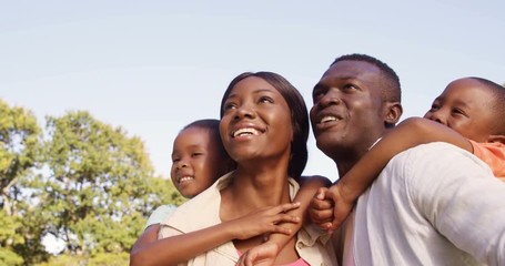 Poster - Family smiling and pointing away 