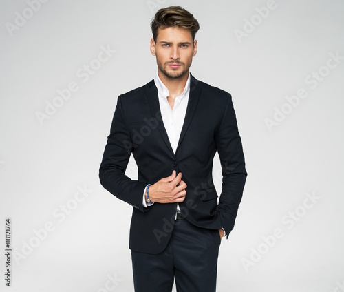 Cuadros en Lienzo Portrait of handsome man in black suit