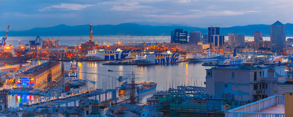 panorama of historical lanterna old lighthouse, container and passenger terminals in seaport of geno