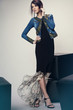 © EVGENY FREEONE - Woman in denim jacket and long dress