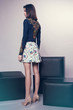 © EVGENY FREEONE - Woman in denim jacket and skirt
