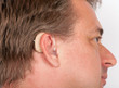 © andras_csontos - Senior man wearing hearing aid