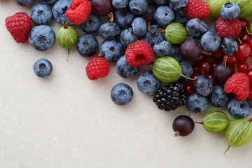 Wall Mural - Berries mix over concrete background