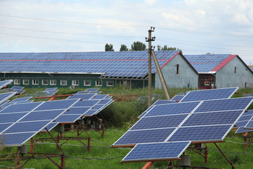 Installation of solar panels on the roof and on the ground. Installation of solar panels in rural areas. 