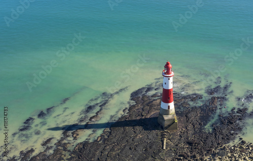 Fotografie, Obraz Lighthouse on a sunny day in Seven Sisters, England.