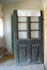 detail of old building with wooden door