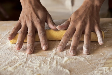 woman cooking homemade pasta