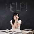 © Creativa Images - Scared student and Help word