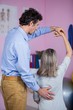 © WavebreakmediaMicro - Physiotherapist giving back massage to patient