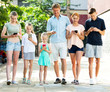 © JackF - Young family with children looking at phone