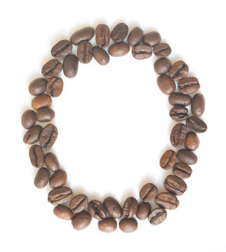  Letter O made of coffee beans under a daylight isolated on white background