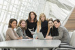 © Mark Edward Atkinson/Tracey Lee/Blend Images - Businesswomen posing in conference room