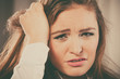 © Voyagerix - Stressed young woman pulling hair.