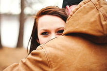 Close Up Of Couple Hugging In Park