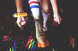 © Shestock/Blend Images - High angle view of woman lacing up roller-skates
