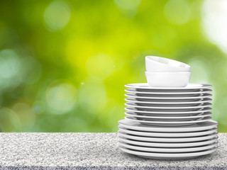 Wall Mural - stack of dishes on granite counter