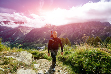 Wall Mural - hiker in the Apls mountains. Trek near Matterhorn mount