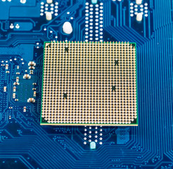 Wall Mural - blue circuit board background of computer motherboard