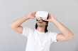 © zinkevych - Cheerful man using virtual reality device