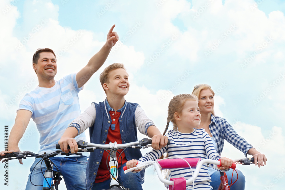 Happy family on bike ride
