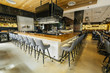 © Inti St Clair/Blend Images - Tables and chairs in modern bar and restaurant