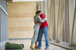 © Mark Edward Atkinson/Tracey Lee/Blend Images - African American soldier hugging husband in airport