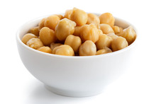 Cooked Chickpeas In White Bowl Isolated On White.
