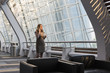 © Mark Edward Atkinson/Tracey Lee/Blend Images - Caucasian businesswoman using cell phone
