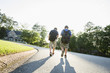© Kevin Dodge/Blend Images - Caucasian boys walking in road