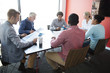 © Resolution Productions/Blend Images - Business people talking in conference room meeting